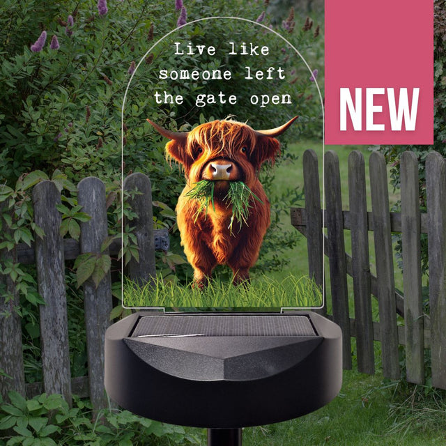 'Live like someone left the gate open' Highland Cow Solar Stake