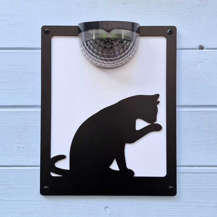 Grooming Cat Solar Light Wall Plaque