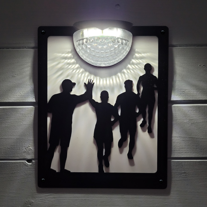 Running Group Solar Light Wall Plaque