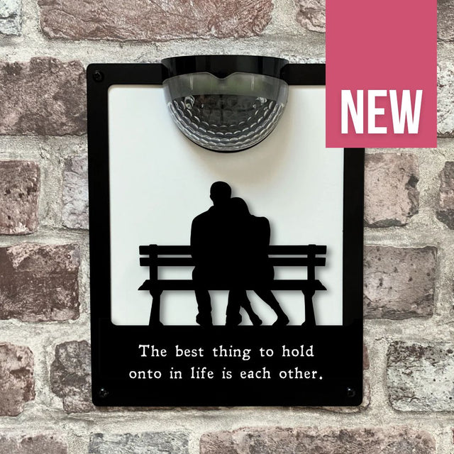 'The best thing to hold onto in life is each other' Couple on Bench Solar Light Wall Plaque