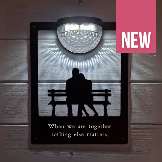 'When we are together nothing else matters' Couple on Bench Solar Light Wall Plaque